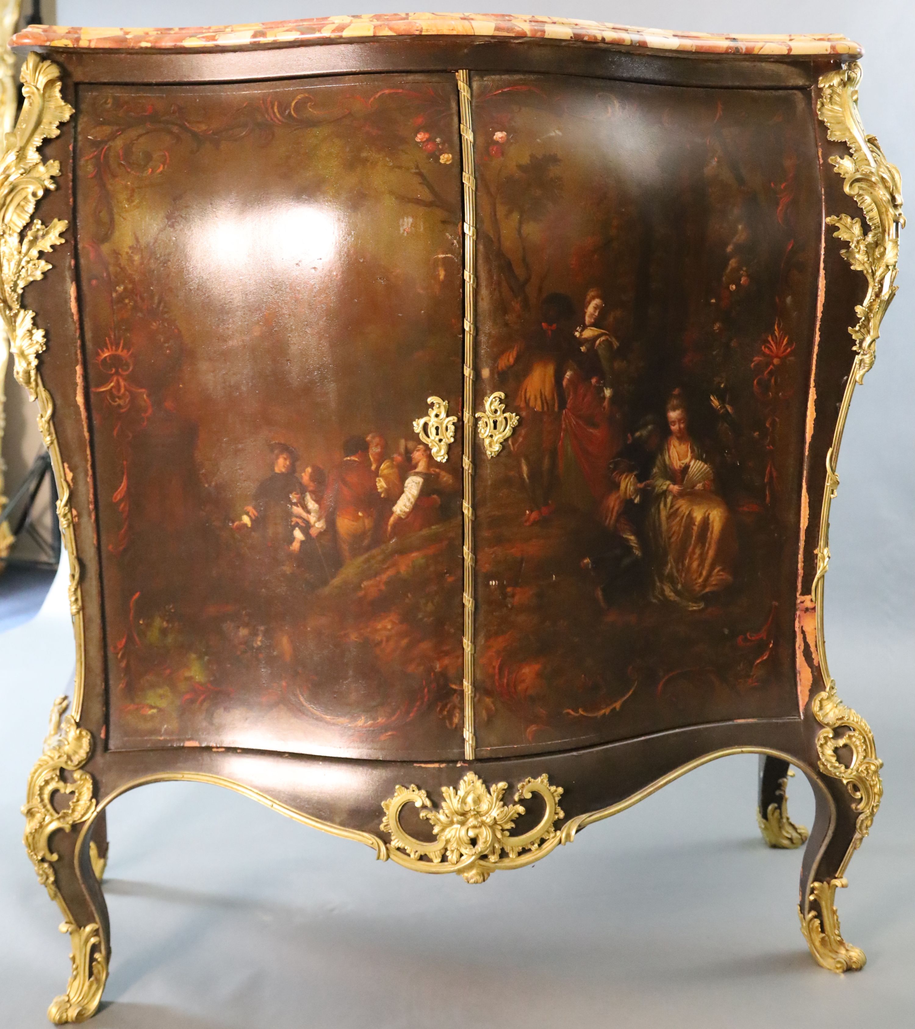 A late 19th century Louis XVI style serpentine bombe commode, W.4ft D.1ft 8in. H.4ft 3in.